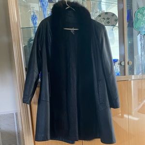 Like new Tibor women swing knee length Black Leather Coat with Fox fur trim